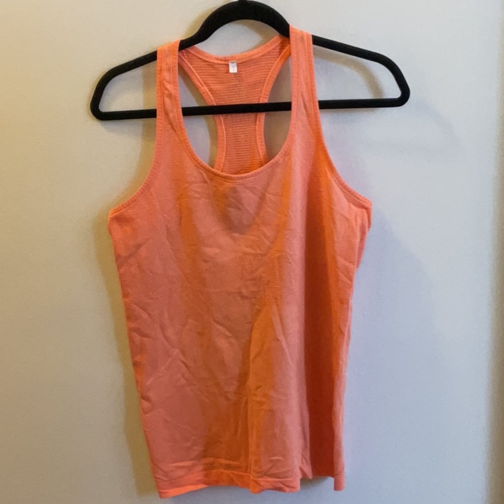 Lululemon Swiftly Tech Racerback Tank. Hip length.